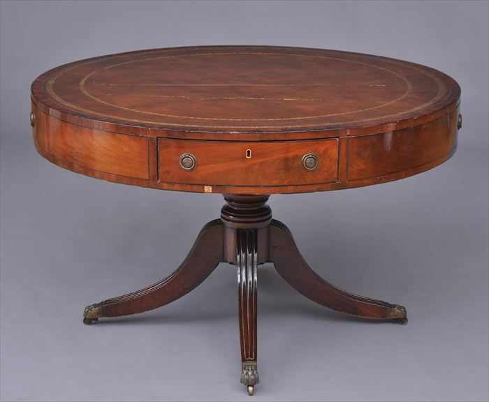 Appraisal: GEORGE III INLAID MAHOGANY DRUM TABLE The gold-tooled brown leather