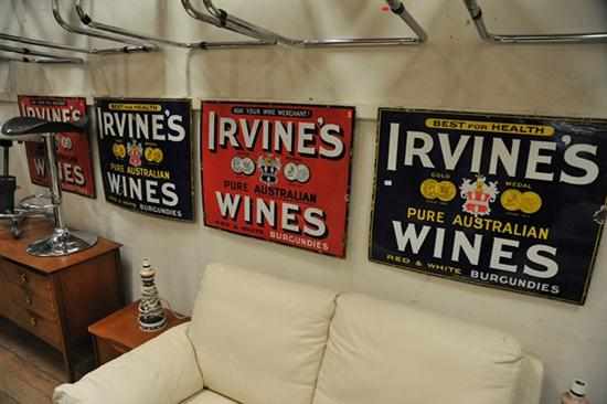 Appraisal: FOUR IRVINE'S PURE AUSTRALIAN WINES ENAMEL ADVERTISING SIGNS