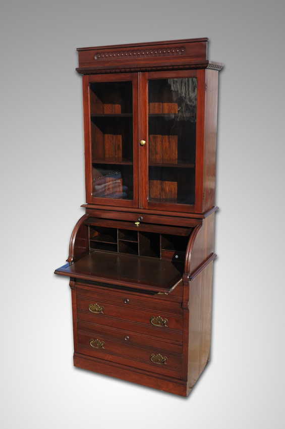 Appraisal: SECRETARY ROLL TOP DESK Carved crest top with glass doors