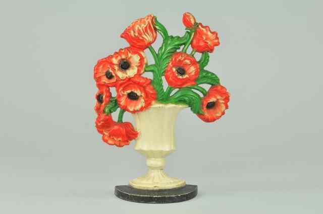 Appraisal: POPPIES DOORSTOP Hubley cast iron marked vibrant colors beautifully arranged