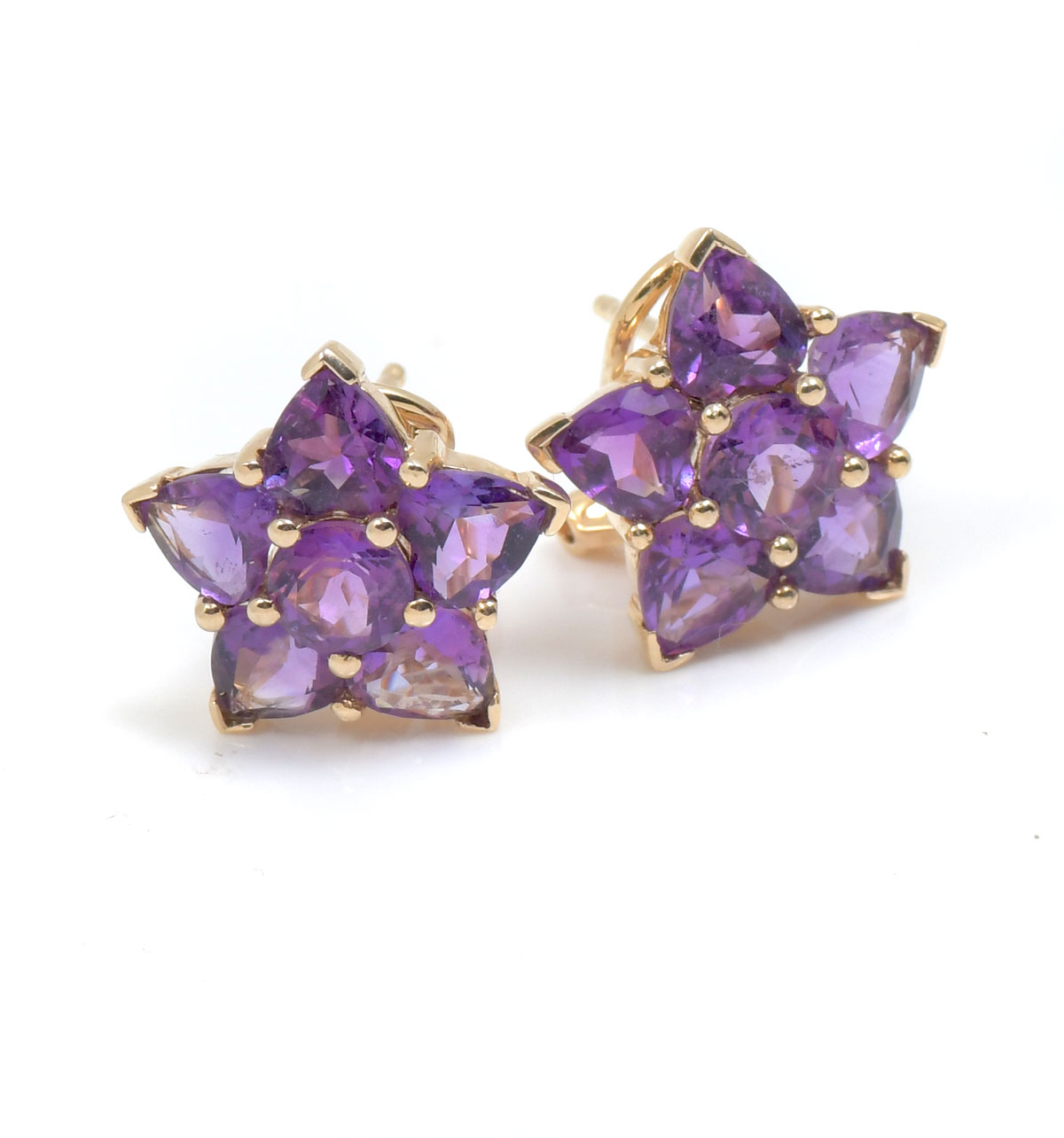 Appraisal: K AMETHYST STAR SHAPED EAR CLIPS Approx CTW amethyst form