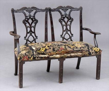 Appraisal: EARLY GEORGE III-STYLE CARVED MAHOGANY TWO-CHAIR BACK SETTEE The serpentine