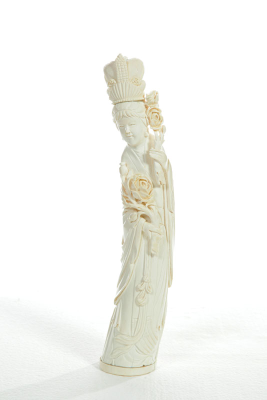 Appraisal: IVORY FIGURE China st half- th century Figure of Quan-yin