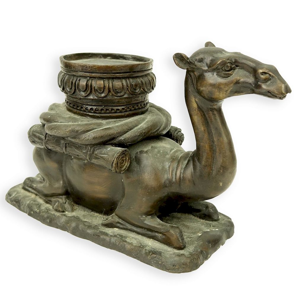 Appraisal: A Bronze Seated Camel Sculpture A Bronze Seated Camel Sculpture