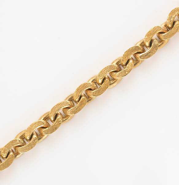 Appraisal: An k gold textured hollow curb link bracelet weighing grams