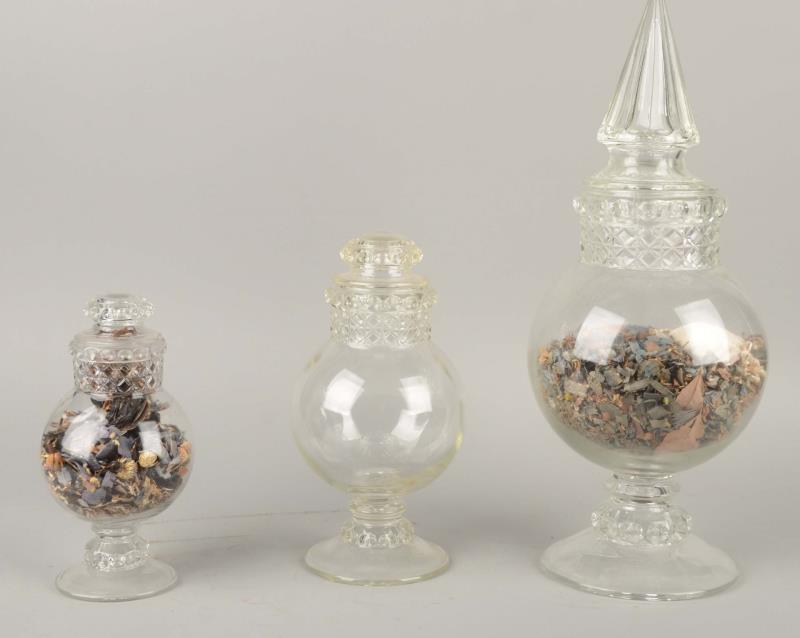 Appraisal: Lot Of Rounded Glass Candy Jars And Lids You get