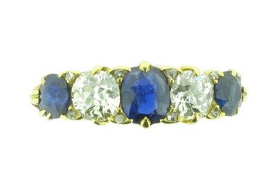 Appraisal: A sapphire and diamond five stone ring Set with three