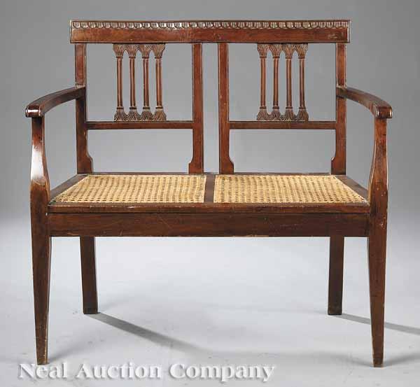 Appraisal: An Antique Italian Carved Walnut and Cane Settee c double