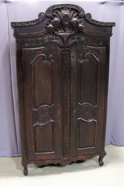 Appraisal: Country French Style Armoire Heavily carved armoire with shelved interior