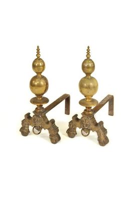 Appraisal: A pair of Dutch brass andirons in late th century