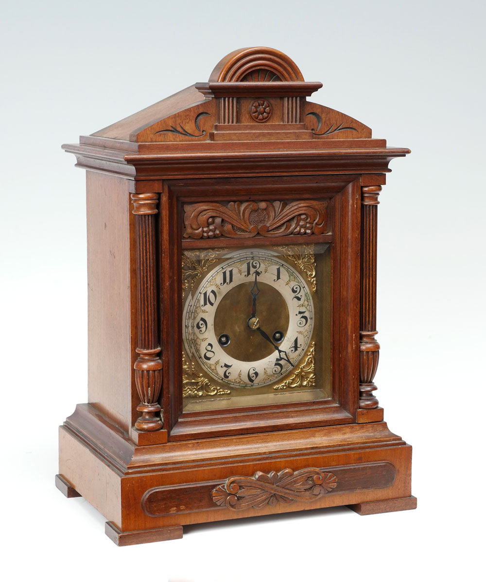 Appraisal: CARVED WALNUT BRACKET CLOCK Walnut bracket clock having a ribbed