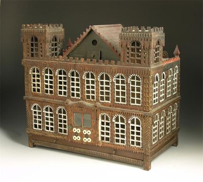 Appraisal: A th century carved wood and painted bird cage modelled