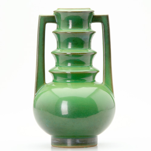 Appraisal: ROSEVILLE Futura green vase with stepped neck and two angular