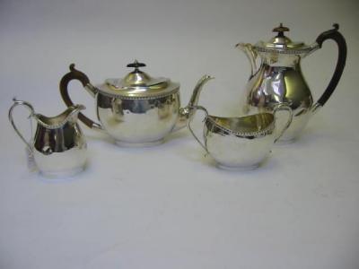 Appraisal: A MATCHED TEA AND COFFEE SET Horace Woodward Co Ltd