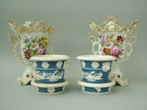 Appraisal: A pair of English bone china Rockingham style vases late