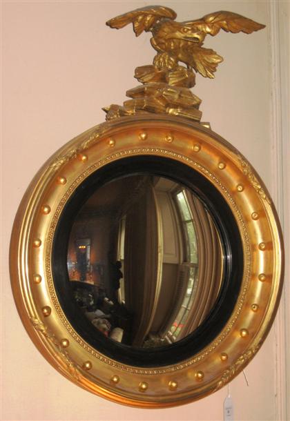 Appraisal: Classical giltwood convex mirror th century