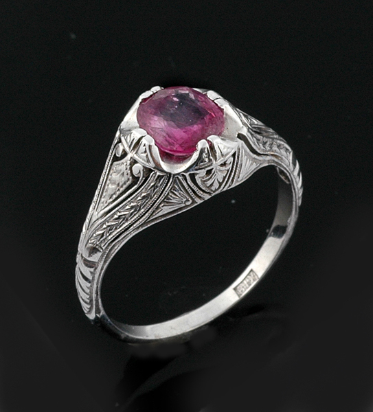 Appraisal: A pink sapphire ring The oval pink sapphire weighing cts