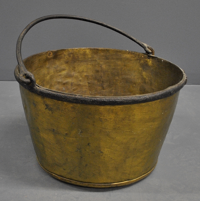 Appraisal: - Brass apple butter kettle th c with an iron