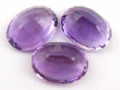 Appraisal: Three loose polished amethysts carat carat and carat respectively