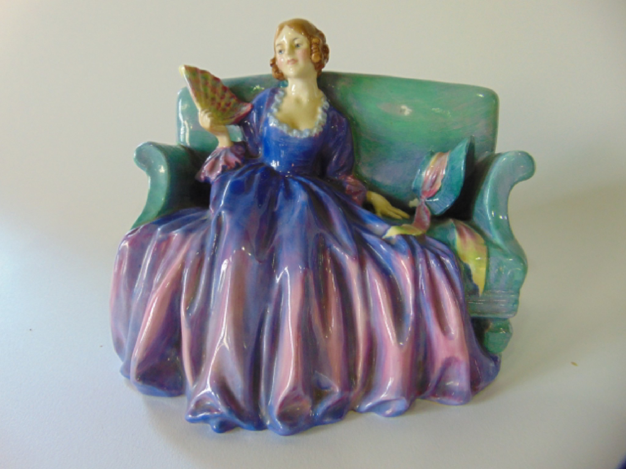 Appraisal: A Royal Doulton figure Sweet Twenty HN with printed and