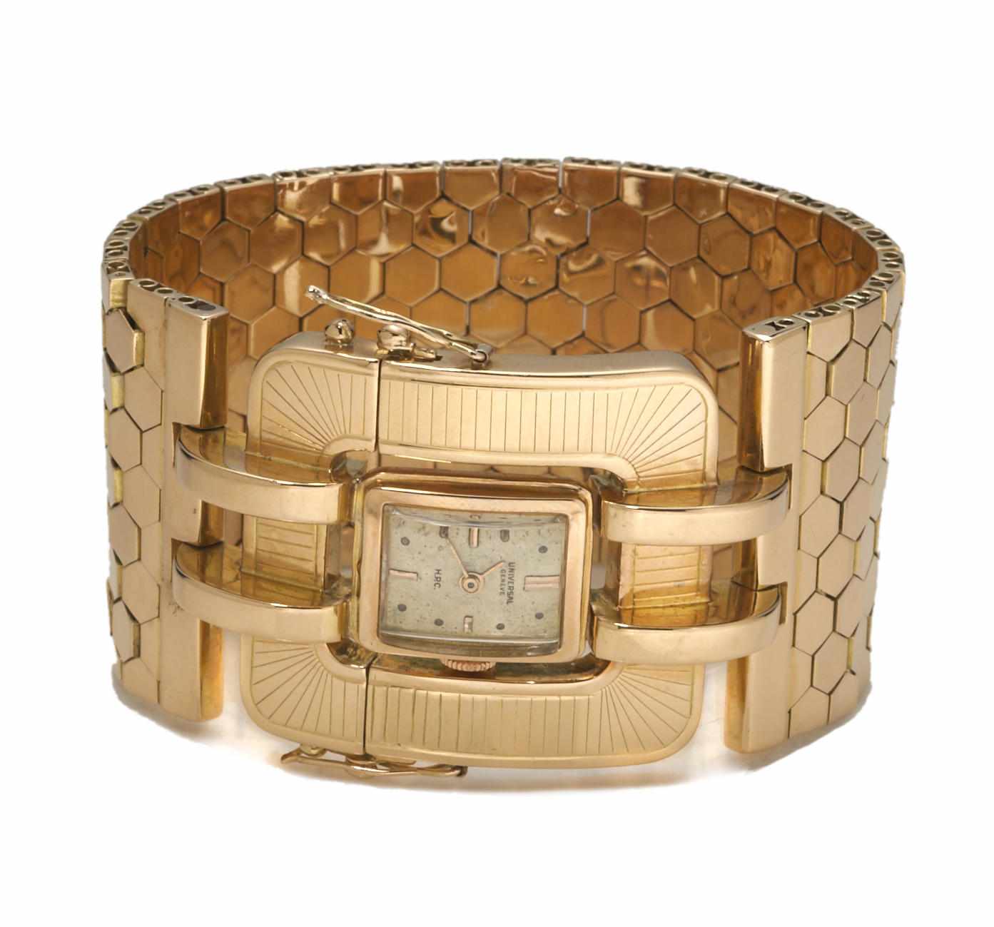 Appraisal: An eighteen karat gold integral wide bracelet wristwatch Universal Geneve