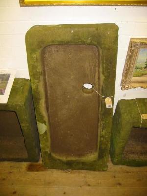 Appraisal: A YORKSHIRE STONE SINK of shallow oblong form with rounded