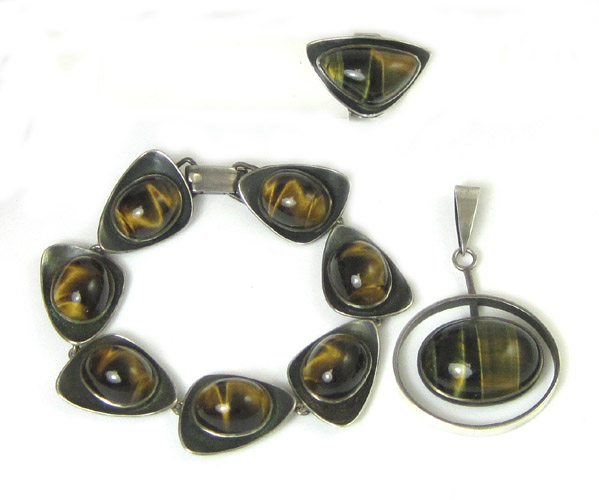 Appraisal: MODERNIST TIGER EYE BRACELET RING AND PENDANT set in sterling