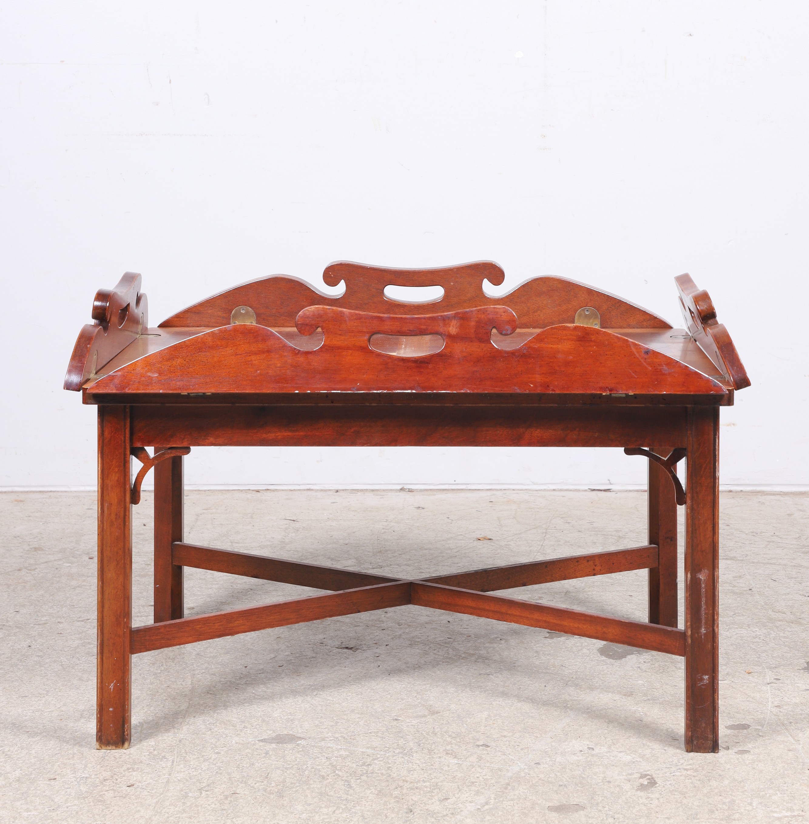 Appraisal: Thomasville Chinese Chippendale style mahogany butler's coffee table scrolled handles