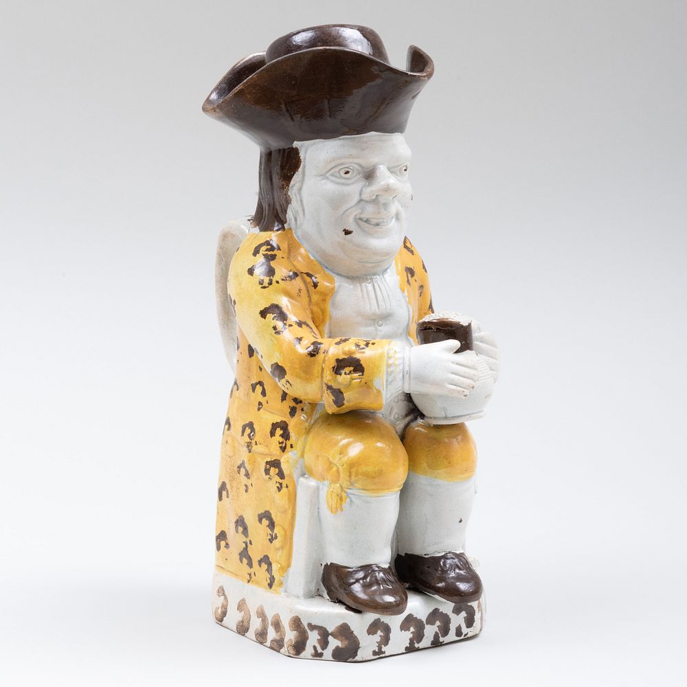 Appraisal: George III Pealware Toby Jug and Cover in high Sold