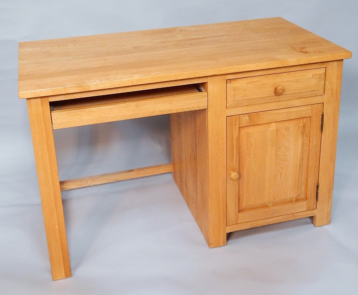 Appraisal: A light oak office desk width cm depth cm height