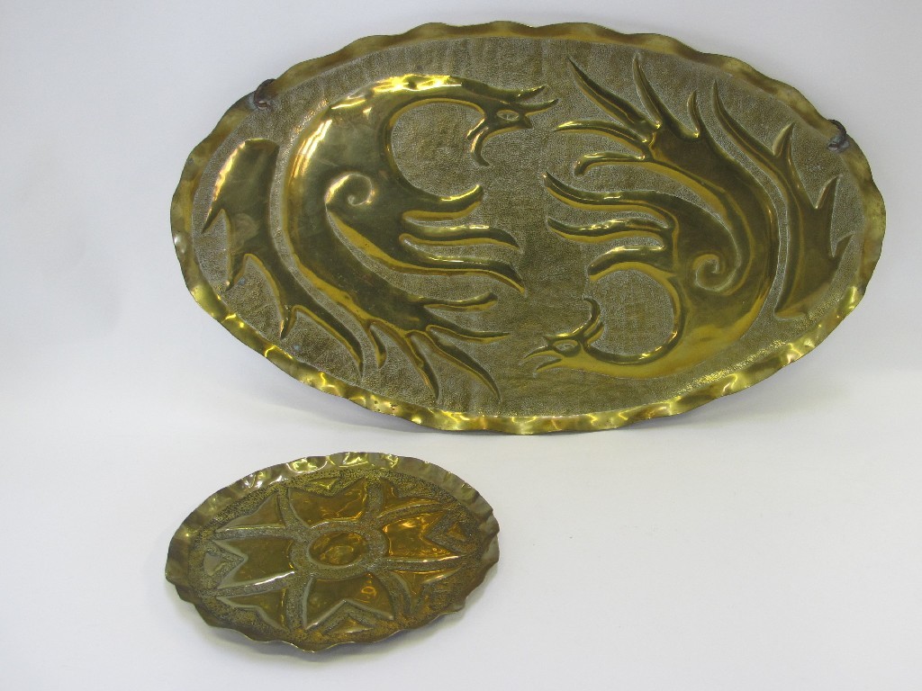 Appraisal: Two brass trays with stylised decoration