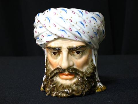 Appraisal: CONTINENTAL PORCELAIN MODEL OF A TURK'S HEAD h w d