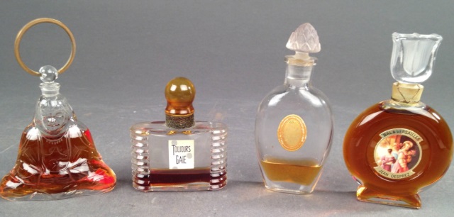 Appraisal: Baccarat Sitting Buddha Perfume Bottle Along with a factory sealed