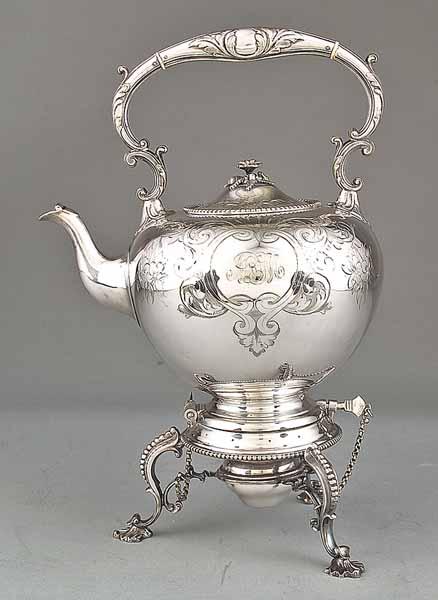 Appraisal: A Victorian Silverplate Kettle-on-Stand with heating element mid- th c