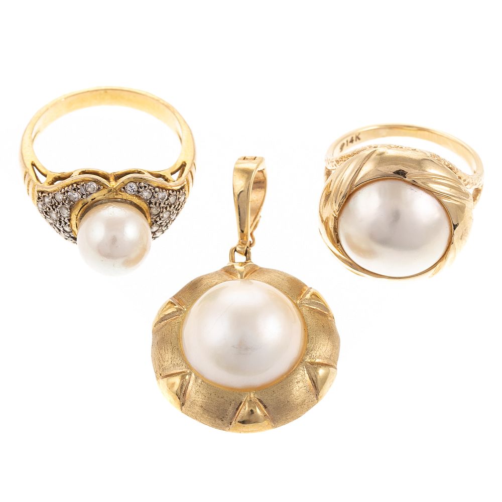 Appraisal: Two Pearl Rings with Pearl Enhancer in K K yellow