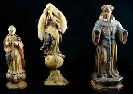 Appraisal: THREE WOOD SANTOS FIGURES including a tonsured male saint probably