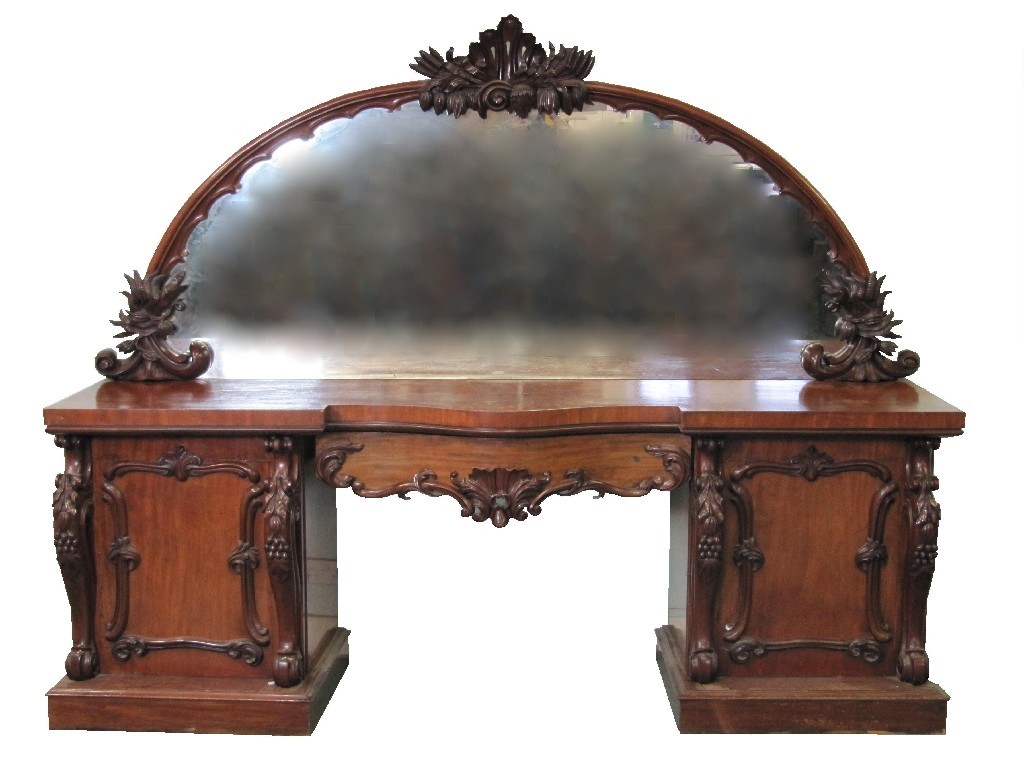 Appraisal: Victorian mahogany overmantle pedestal sideboard the carved flowerhead pediment raised