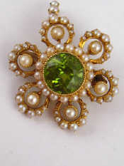 Appraisal: A fine Edwardian peridot and seed pearl pendant with detachable