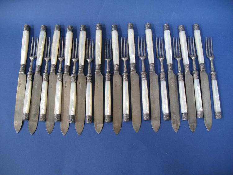 Appraisal: A SET OF TWELVE LATE VICTORIAN DESSERT KNIVES AND FORKS