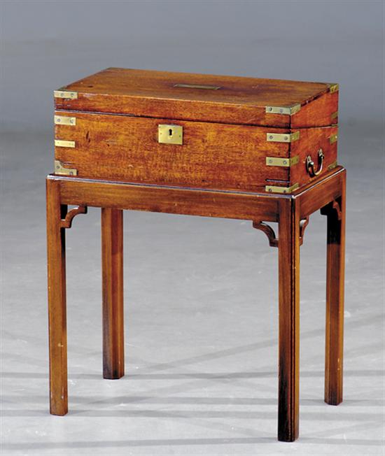 Appraisal: English mahogany and brass-bound lap desk on stand circa rectangular