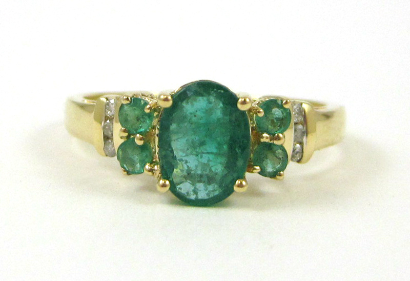 Appraisal: EMERALD DIAMOND AND FOURTEEN KARAT GOLD RING with two round-cut