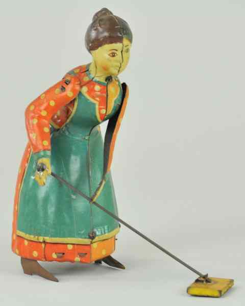 Appraisal: BUSY LIZZIE Germany lithographed tin amusing toy depicts full figured