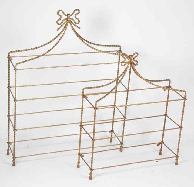 Appraisal: Two iron framed hanging wall shelves with glass shelves decorated