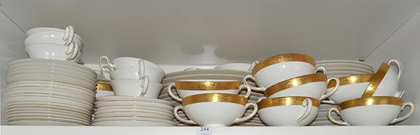 Appraisal: A LARGE COLLECTION OF WEDGWOOD EMBOSSED GILT BORDERED DINNER WARE