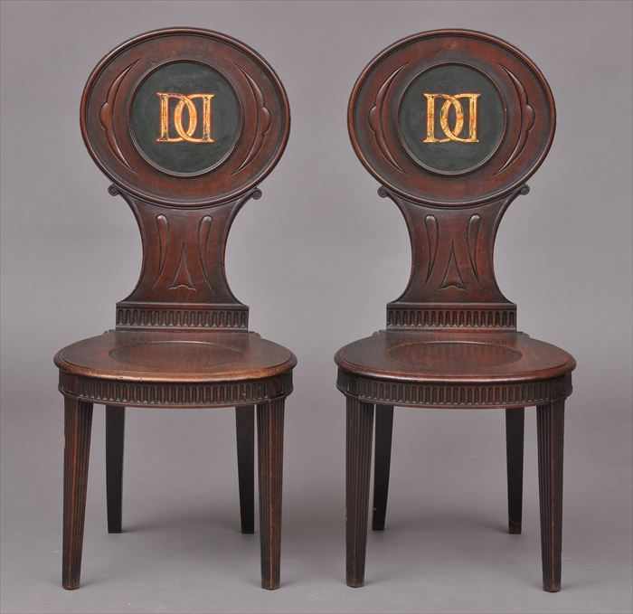 Appraisal: PAIR OF GEORGE III-STYLE MAHOGANY HALL CHAIRS MONOGRAMMED DD Each