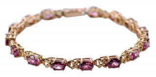 Appraisal: kt Garnet Bracelet link bracelet with oval faceted purple rhodolite