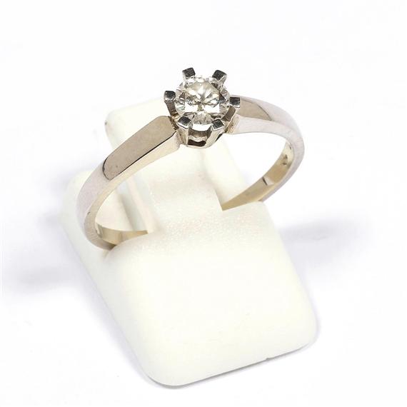 Appraisal: DIAMOND RING Vienna White gold Elegant solitaire ring with a