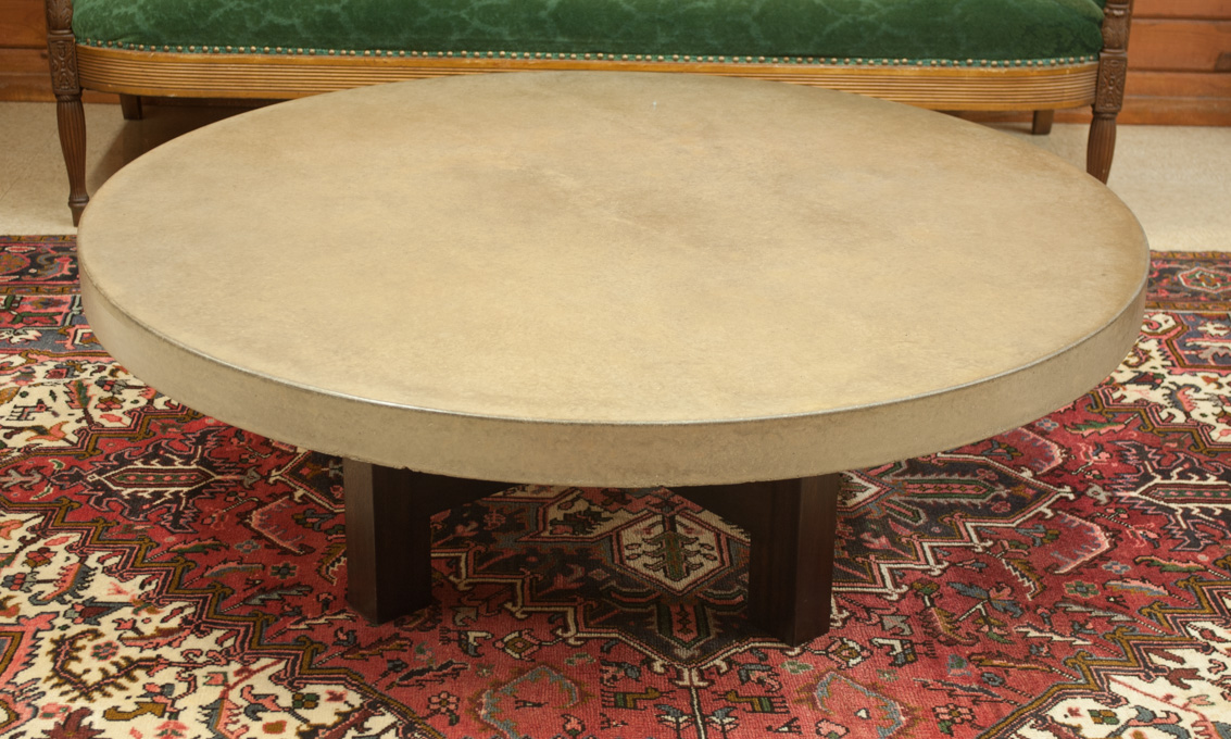 Appraisal: ROUND CONCRETE TOP COCKTAIL TABLE American made recent production the