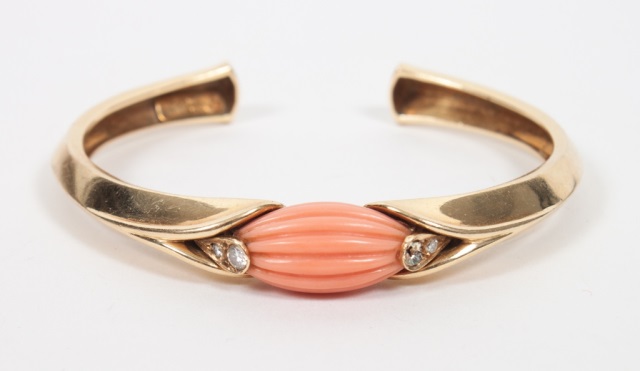 Appraisal: Van Cleef Arpels K gold coral diamond bangle bracelet centering