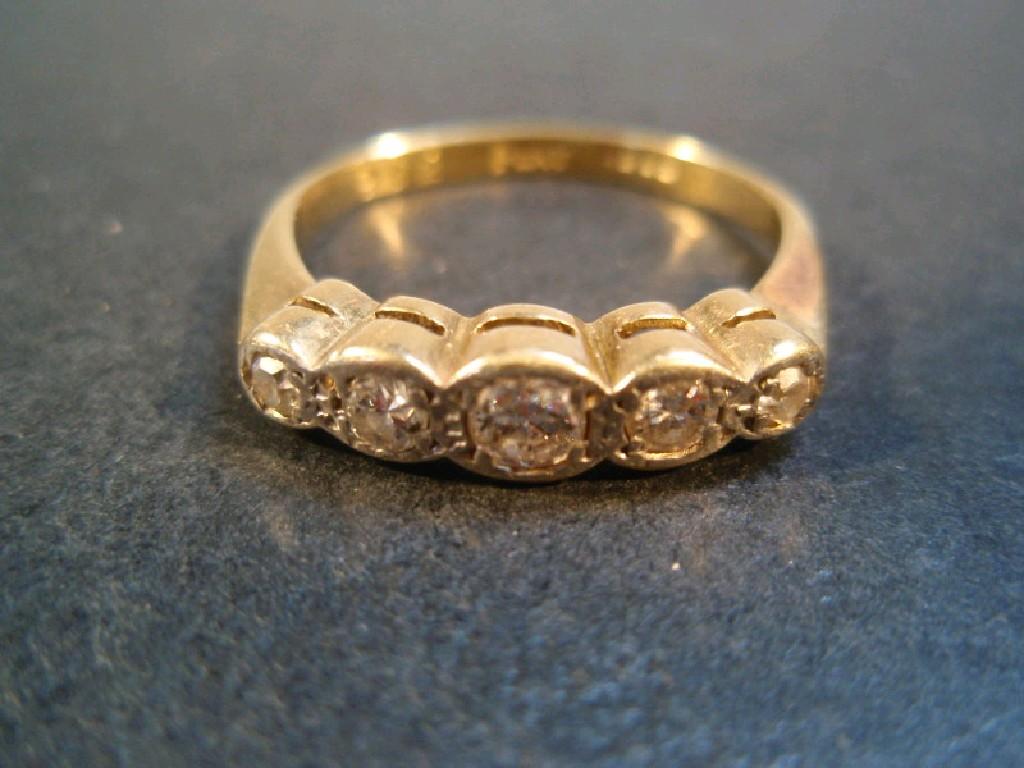 Appraisal: A five stone in-line diamond set ring of five small